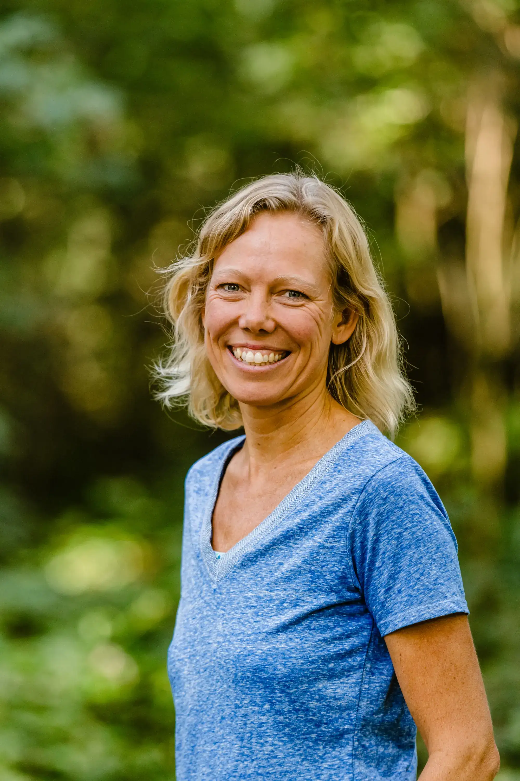 Chantal Bruijsten, retreat guide and therapist, in a natural green setting