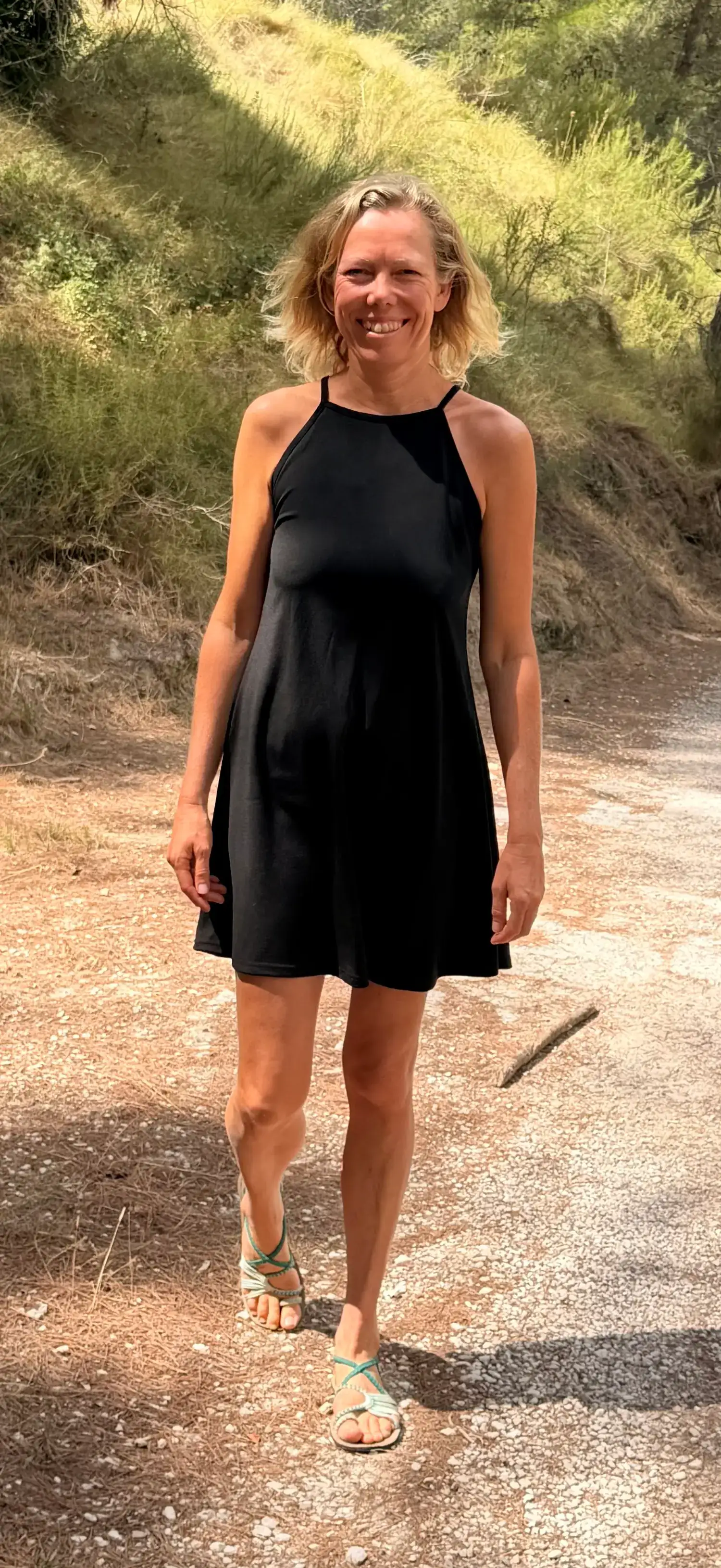 Chantal Bruijsten standing in a natural Spanish landscape